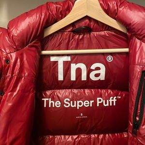 Tna: The Super Puff in medium length and size S.